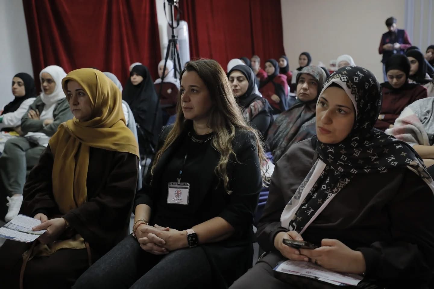 Community members gathered during a health awareness session at Stars College