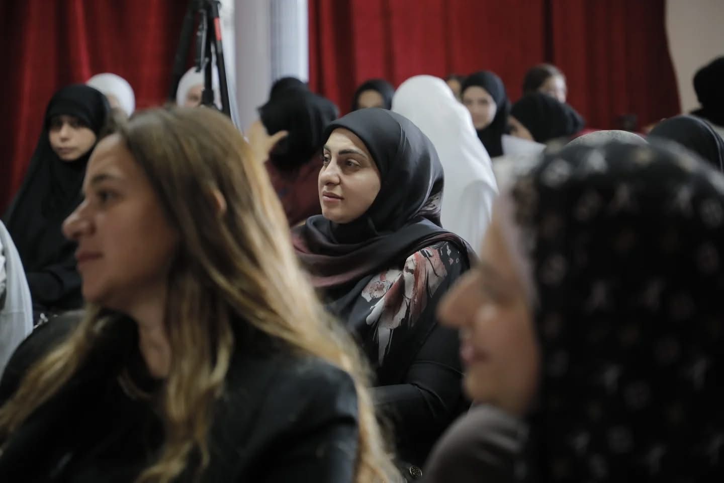 Community members gathered during a health awareness session at Stars College